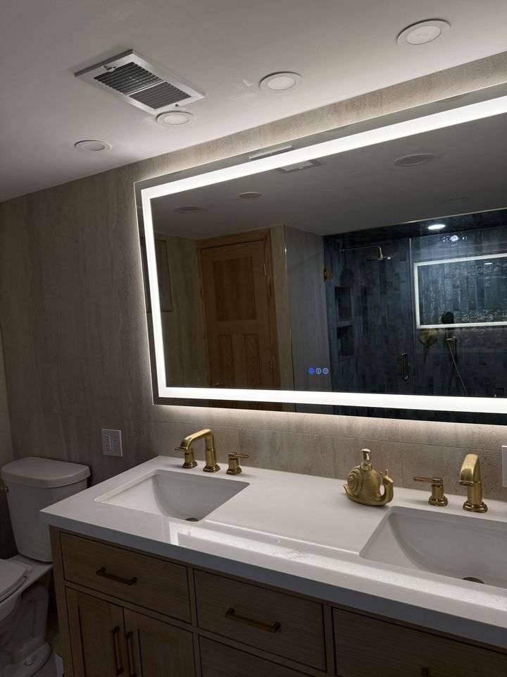 Double vanity with backlit mirror
